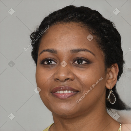 Joyful black young-adult female with medium  black hair and brown eyes