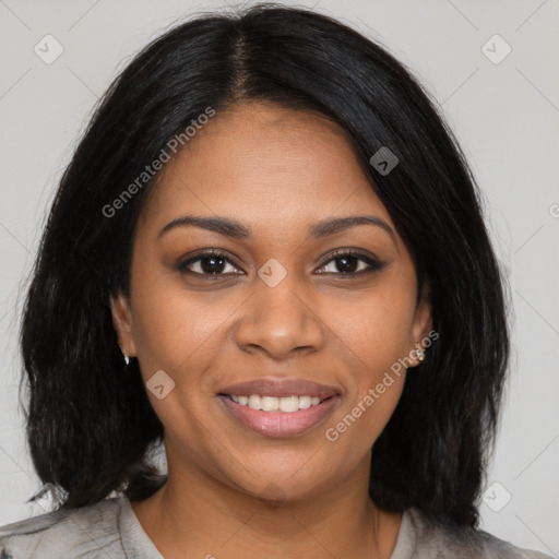 Joyful black young-adult female with medium  black hair and brown eyes