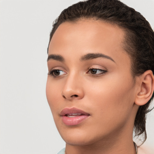 Neutral white young-adult female with medium  brown hair and brown eyes