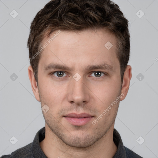 Neutral white young-adult male with short  brown hair and grey eyes