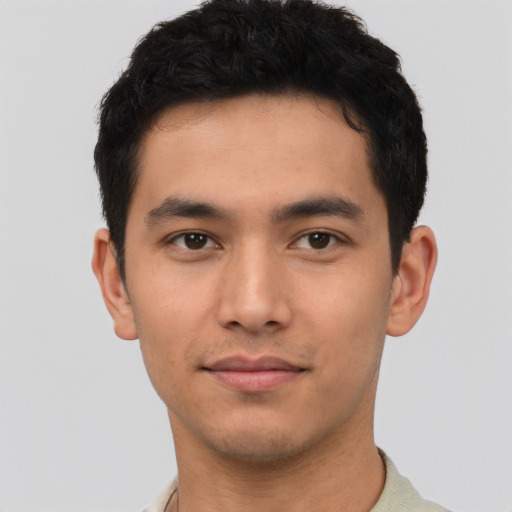 Neutral latino young-adult male with short  brown hair and brown eyes