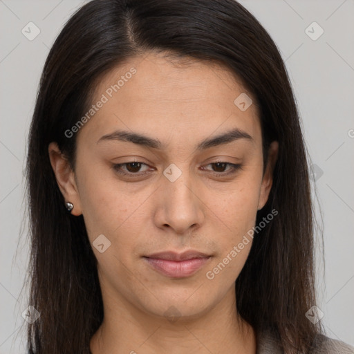 Joyful latino young-adult female with long  brown hair and brown eyes