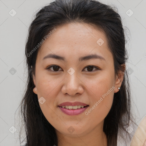 Joyful white young-adult female with long  brown hair and brown eyes