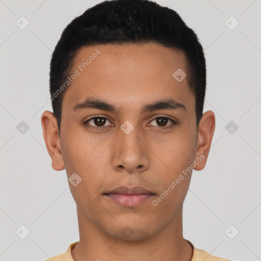 Neutral latino young-adult male with short  black hair and brown eyes