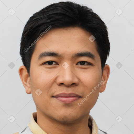 Joyful asian young-adult male with short  brown hair and brown eyes