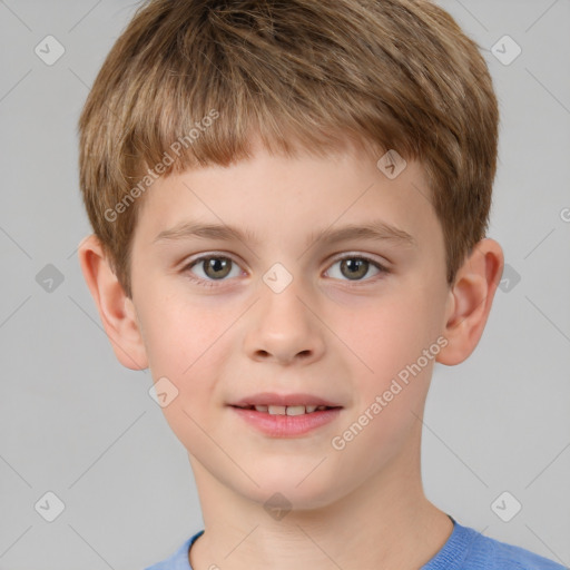 Joyful white child male with short  brown hair and brown eyes