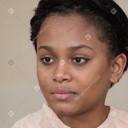 Neutral black young-adult female with short  brown hair and brown eyes