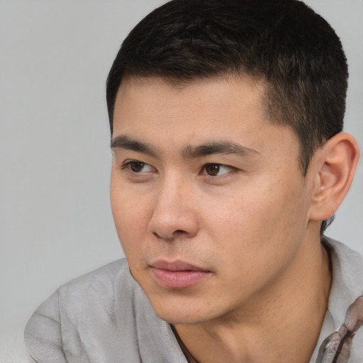 Neutral white young-adult male with short  black hair and brown eyes