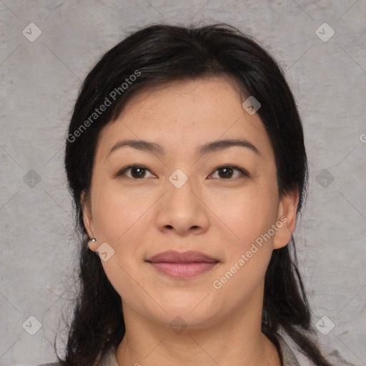 Joyful asian young-adult female with medium  black hair and brown eyes