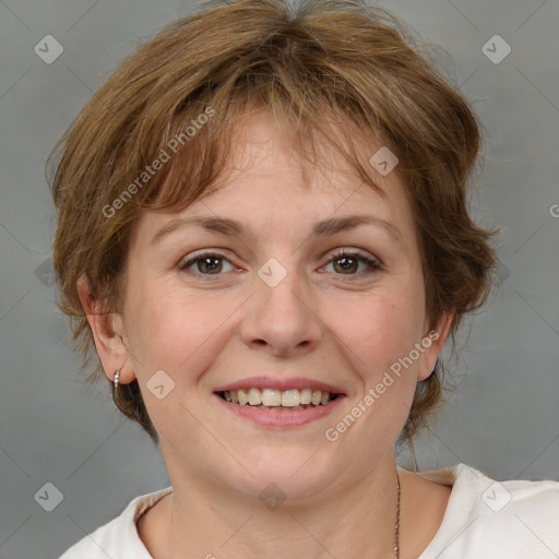 Joyful white adult female with medium  brown hair and grey eyes