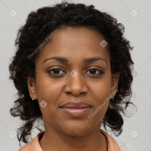 Joyful black young-adult female with medium  brown hair and brown eyes