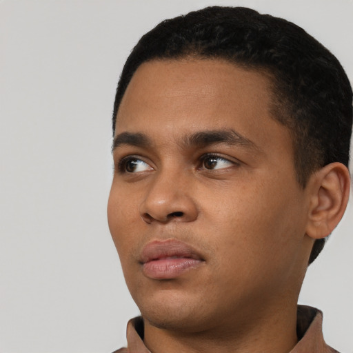 Neutral black young-adult male with short  black hair and brown eyes