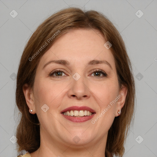 Joyful white adult female with medium  brown hair and grey eyes