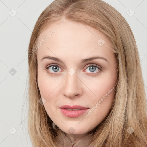 Joyful white young-adult female with long  brown hair and blue eyes