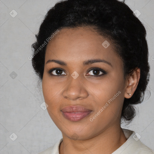 Joyful black young-adult female with medium  black hair and brown eyes