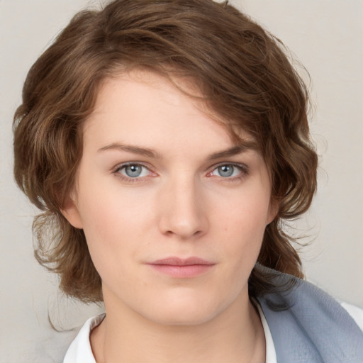 Neutral white young-adult female with medium  brown hair and blue eyes