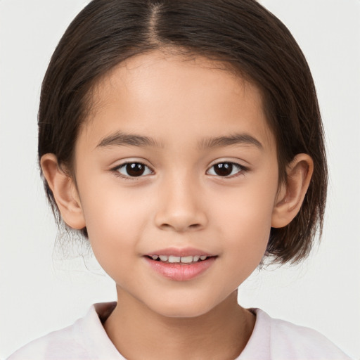 Joyful white child female with medium  brown hair and brown eyes