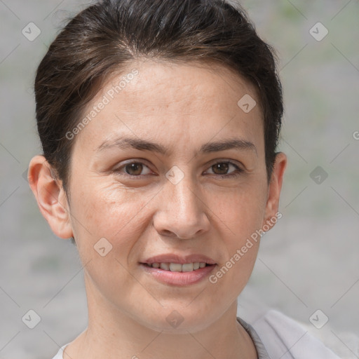 Joyful white adult female with short  brown hair and brown eyes