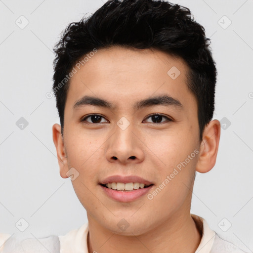 Joyful asian young-adult male with short  brown hair and brown eyes