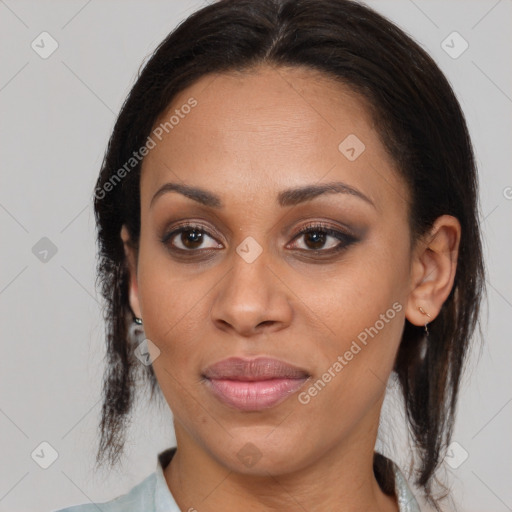 Joyful latino young-adult female with medium  brown hair and brown eyes