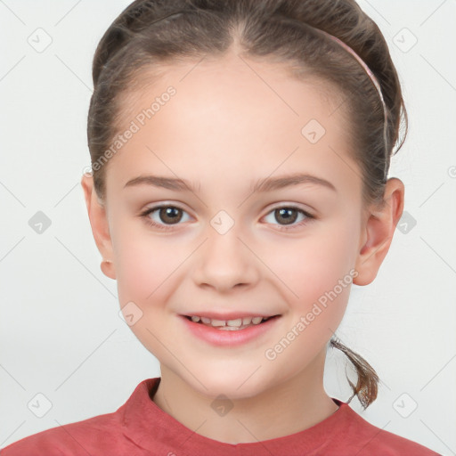 Joyful white child female with short  brown hair and brown eyes