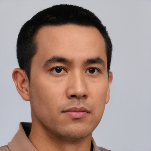 Neutral asian young-adult male with short  black hair and brown eyes