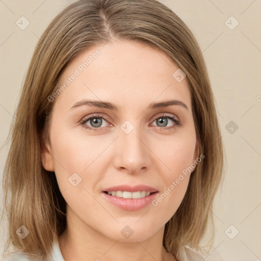 Joyful white young-adult female with medium  brown hair and green eyes