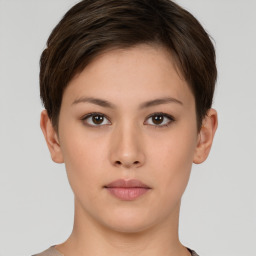 Neutral white young-adult female with short  brown hair and brown eyes