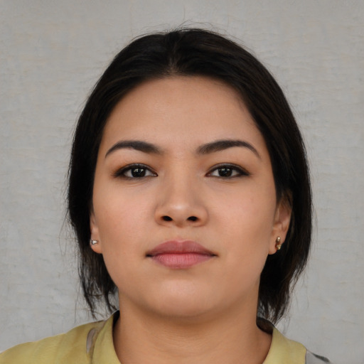 Neutral asian young-adult female with medium  black hair and brown eyes
