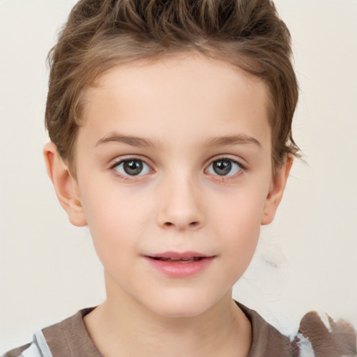 Joyful white child female with short  brown hair and brown eyes