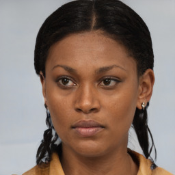 Neutral black young-adult female with short  brown hair and brown eyes