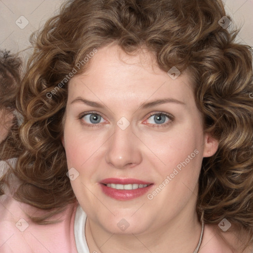 Joyful white young-adult female with medium  brown hair and blue eyes