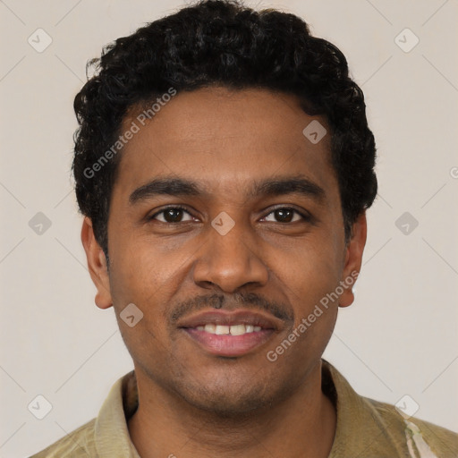 Joyful black young-adult male with short  black hair and brown eyes