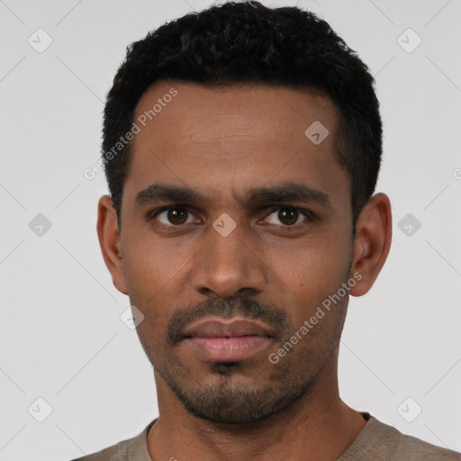 Neutral latino young-adult male with short  black hair and brown eyes
