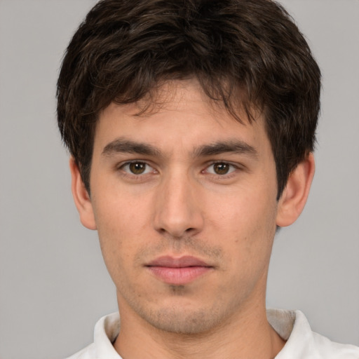 Neutral white young-adult male with short  brown hair and brown eyes