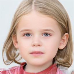 Neutral white child female with medium  brown hair and grey eyes
