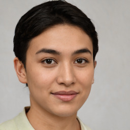 Joyful latino young-adult female with short  brown hair and brown eyes