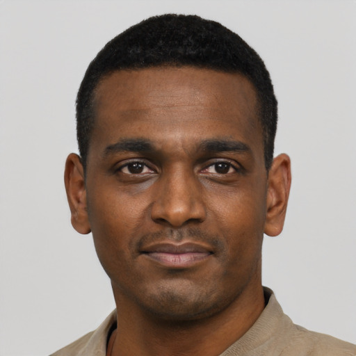 Neutral black young-adult male with short  black hair and brown eyes