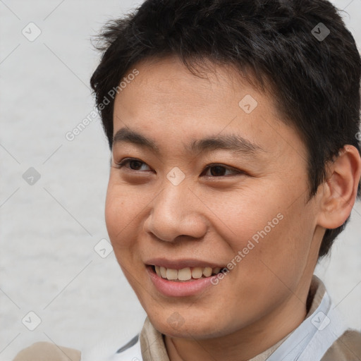 Joyful asian young-adult male with short  brown hair and brown eyes