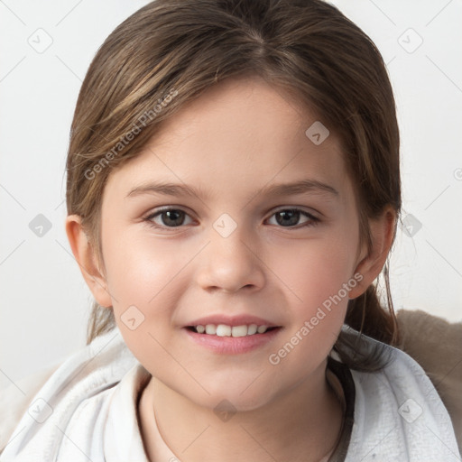 Joyful white child female with short  brown hair and brown eyes