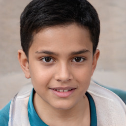 Joyful white child male with short  brown hair and brown eyes