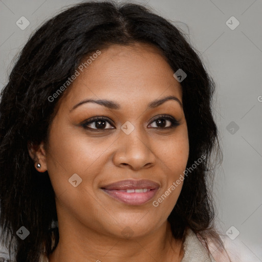 Joyful black young-adult female with long  brown hair and brown eyes