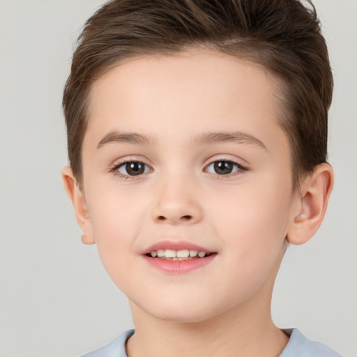 Joyful white child female with short  brown hair and brown eyes