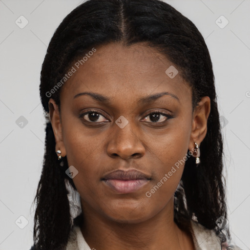 Neutral black young-adult female with long  brown hair and brown eyes