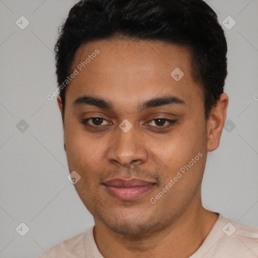 Joyful latino young-adult male with short  black hair and brown eyes