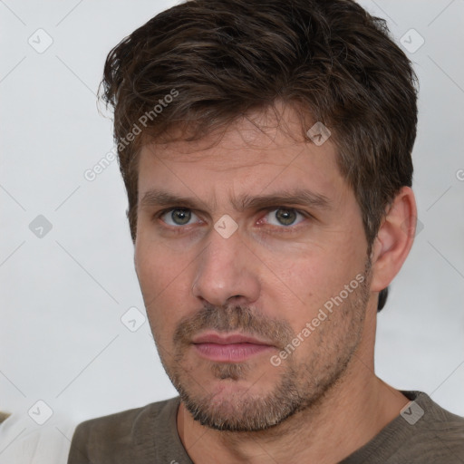 Neutral white adult male with short  brown hair and brown eyes