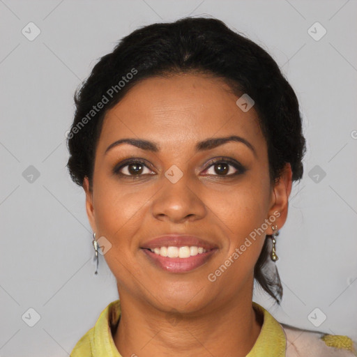 Joyful black young-adult female with short  black hair and brown eyes