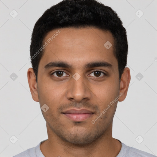 Neutral latino young-adult male with short  black hair and brown eyes