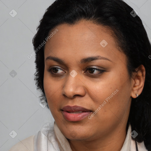 Joyful black young-adult female with medium  brown hair and brown eyes