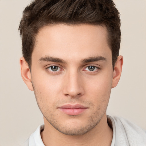 Neutral white young-adult male with short  brown hair and brown eyes